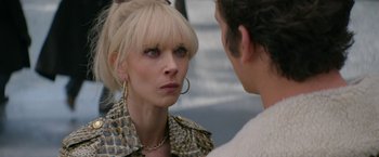 Movie still from “The Offer” (2022), directed by Dexter Fletcher – A woman is looking at a man with a serious look on her face; Close Up shot, Over the shoulder angle