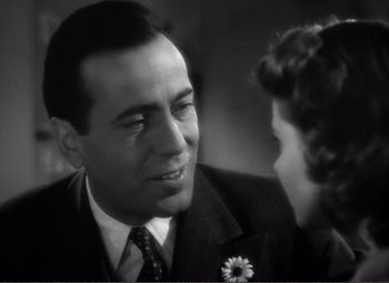 Movie still from “Casablanca” (1942), directed by Michael Curtiz – A man and a woman talking to each other; Close Up shot, Over the shoulder angle