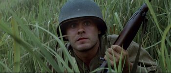 Movie still from “The Thin Red Line” (1998), directed by Terrence Malick – Close Up shot, High angle