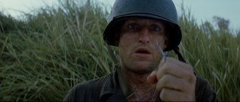 Movie still from “The Thin Red Line” (1998), directed by Terrence Malick – Close Up shot, High angle