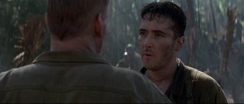 Movie still from “The Thin Red Line” (1998), directed by Terrence Malick – Close Up shot, Over the shoulder angle