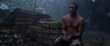 Movie still from “The Thin Red Line” (1998), directed by Terrence Malick – Medium shot, Low angle