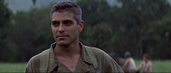 Movie still from “The Thin Red Line” (1998), directed by Terrence Malick – A person wearing a jacket; Close Up shot, Low angle