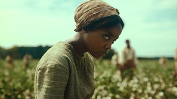 Movie still from “The Underground Railroad” (2021), directed by Barry Jenkins – Medium shot, Over the shoulder angle