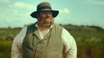 Movie still from “The Underground Railroad” (2021), directed by Barry Jenkins – Medium shot, Low angle