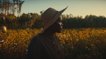 Movie still from “The Underground Railroad” (2021), directed by Barry Jenkins – Medium shot, Low angle
