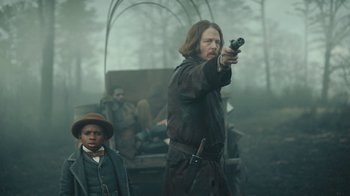 Movie still from “The Underground Railroad” (2021), directed by Barry Jenkins – Medium shot, Over the shoulder angle