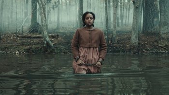 Movie still from “The Underground Railroad” (2021), directed by Barry Jenkins – Medium shot, Over the shoulder angle