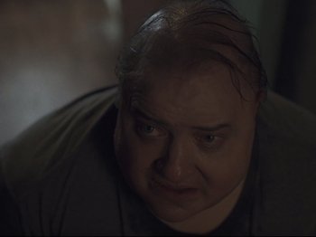 Movie still from “The Whale” (2022), directed by Darren Aronofsky – A person with a bald head; Close Up shot, Low angle