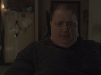 Movie still from “The Whale” (2022), directed by Darren Aronofsky – A person with a nose ring; Close Up shot, Low angle