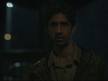 Movie still from “The Whale” (2022), directed by Darren Aronofsky – A person wearing a jacket; Close Up shot, Low angle