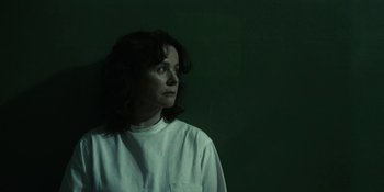 Movie still from “Chernobyl” (2019), directed by Johan Renck – A woman in a white shirt looking up at the sky; Close Up shot, Low angle