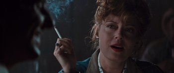 Movie still from “Thelma & Louise” (1991), directed by Ridley Scott – A person holding a cigarette; Close Up shot, Low angle