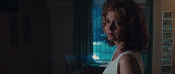 Movie still from “Thelma & Louise” (1991), directed by Ridley Scott – A person standing in a room near a window; Close Up shot, Low angle