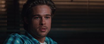 Movie still from “Thelma & Louise” (1991), directed by Ridley Scott – A person wearing a blue shirt; Close Up shot, Over the shoulder angle