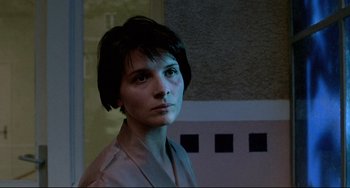 Movie still from “Three Colors: Blue” (1993), directed by Krzysztof Kieslowski – Close Up shot, Low angle
