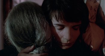 Movie still from “Three Colors: Blue” (1993), directed by Krzysztof Kieslowski – Close Up shot, Over the shoulder angle