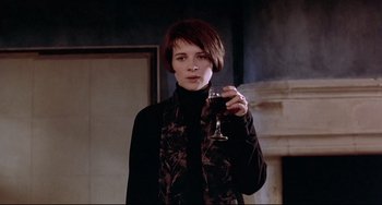 Movie still from “Three Colors: Blue” (1993), directed by Krzysztof Kieslowski – Medium shot, Low angle