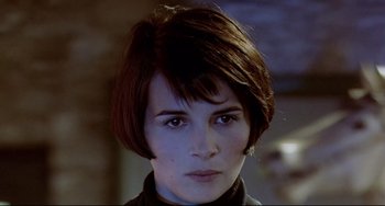 Movie still from “Three Colors: Blue” (1993), directed by Krzysztof Kieslowski – Close Up shot, Over the shoulder angle