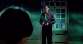 Movie still from “Three Colors: Blue” (1993), directed by Krzysztof Kieslowski – Medium shot, Low angle