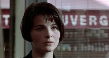 Movie still from “Three Colors: Blue” (1993), directed by Krzysztof Kieslowski – Close Up shot, Over the shoulder angle