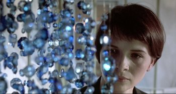 Movie still from “Three Colors: Blue” (1993), directed by Krzysztof Kieslowski – Close Up shot, Over the shoulder angle