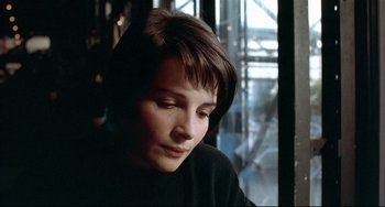 Movie still from “Three Colors: Blue” (1993), directed by Krzysztof Kieslowski – Close Up shot, Over the shoulder angle