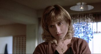 Movie still from “Three Colors: Blue” (1993), directed by Krzysztof Kieslowski – Close Up shot, Over the shoulder angle