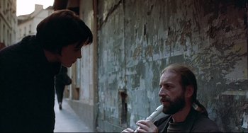 Movie still from “Three Colors: Blue” (1993), directed by Krzysztof Kieslowski – Medium shot, Over the shoulder angle