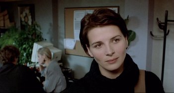 Movie still from “Three Colors: Blue” (1993), directed by Krzysztof Kieslowski – Close Up shot, Over the shoulder angle