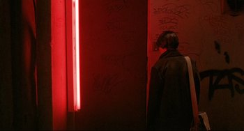 Movie still from “Three Colors: Blue” (1993), directed by Krzysztof Kieslowski – Medium shot, Over the shoulder angle
