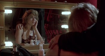 Movie still from “Three Colors: Blue” (1993), directed by Krzysztof Kieslowski – Medium shot, Over the shoulder angle