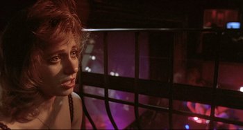 Movie still from “Three Colors: Blue” (1993), directed by Krzysztof Kieslowski – Close Up shot, Over the shoulder angle