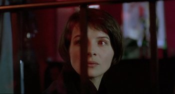 Movie still from “Three Colors: Blue” (1993), directed by Krzysztof Kieslowski – Close Up shot, Over the shoulder angle