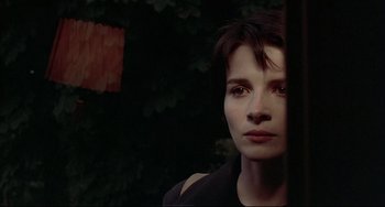 Movie still from “Three Colors: Blue” (1993), directed by Krzysztof Kieslowski – Close Up shot, Over the shoulder angle