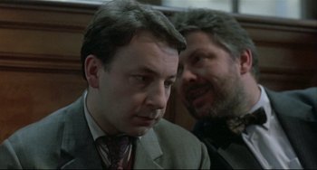 Movie still from “Three Colors: White” (1994), directed by Krzysztof Kieslowski – Close Up shot, Over the shoulder angle