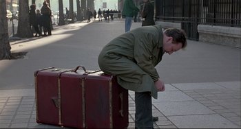 Movie still from “Three Colors: White” (1994), directed by Krzysztof Kieslowski – Wide shot, High angle