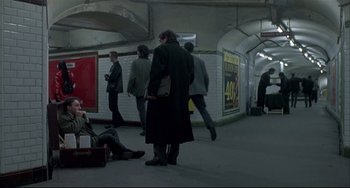 Movie still from “Three Colors: White” (1994), directed by Krzysztof Kieslowski – Wide shot, High angle
