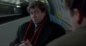 Movie still from “Three Colors: White” (1994), directed by Krzysztof Kieslowski – Close Up shot, Over the shoulder angle