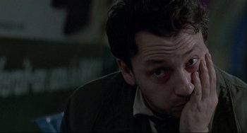 Movie still from “Three Colors: White” (1994), directed by Krzysztof Kieslowski – Close Up shot, High angle