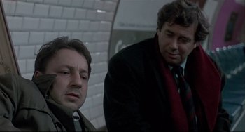 Movie still from “Three Colors: White” (1994), directed by Krzysztof Kieslowski – Close Up shot, Over the shoulder angle