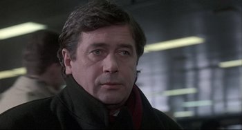 Movie still from “Three Colors: White” (1994), directed by Krzysztof Kieslowski – Close Up shot, Low angle