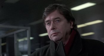 Movie still from “Three Colors: White” (1994), directed by Krzysztof Kieslowski – Close Up shot, Low angle