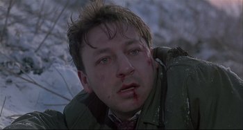 Movie still from “Three Colors: White” (1994), directed by Krzysztof Kieslowski – Close Up shot, Low angle