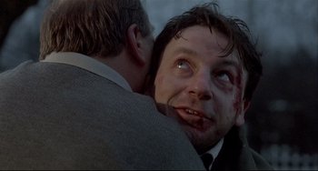 Movie still from “Three Colors: White” (1994), directed by Krzysztof Kieslowski – Close Up shot, Low angle