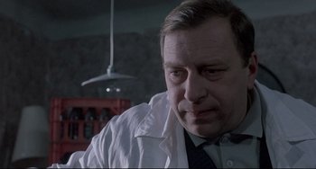 Movie still from “Three Colors: White” (1994), directed by Krzysztof Kieslowski – Close Up shot, Low angle