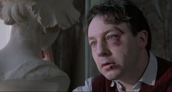 Movie still from “Three Colors: White” (1994), directed by Krzysztof Kieslowski – Close Up shot, Over the shoulder angle