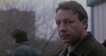 Movie still from “Three Colors: White” (1994), directed by Krzysztof Kieslowski – Close Up shot, Over the shoulder angle