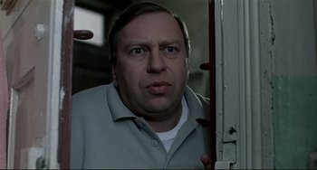 Movie still from “Three Colors: White” (1994), directed by Krzysztof Kieslowski – Close Up shot, Low angle