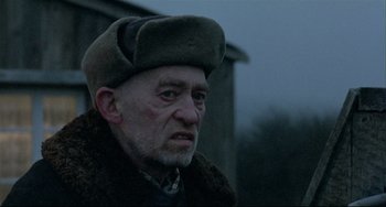 Movie still from “Three Colors: White” (1994), directed by Krzysztof Kieslowski – Close Up shot, Over the shoulder angle